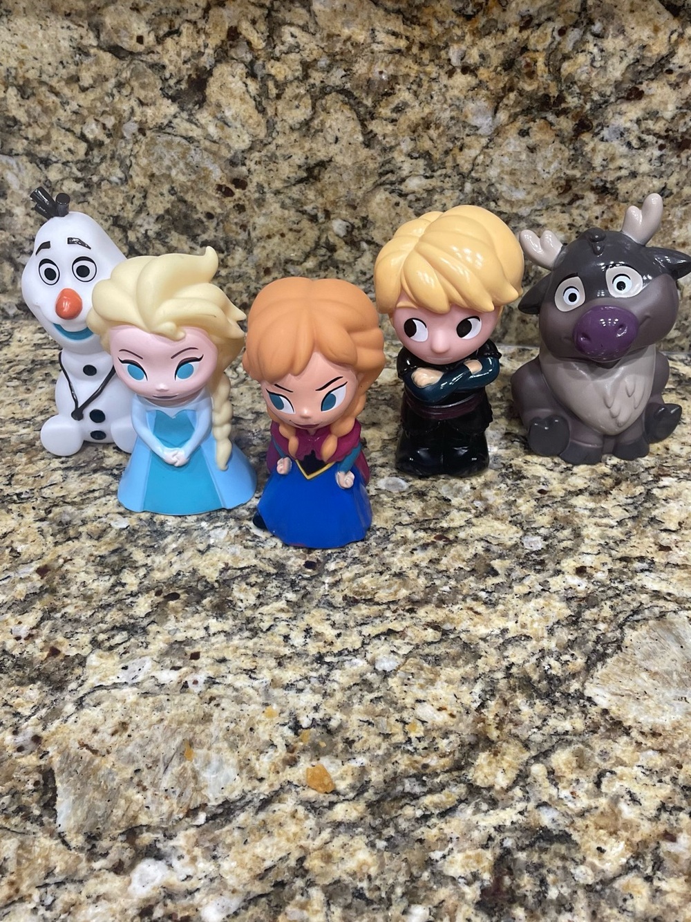 Disney Frozen character bath toys featuring Elsa, Anna, Olaf, Kristoff, and Sven